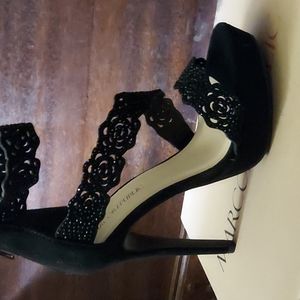 Size 7.5, Black 4.25", open toe, rose cut out straped Marco Republic heal.